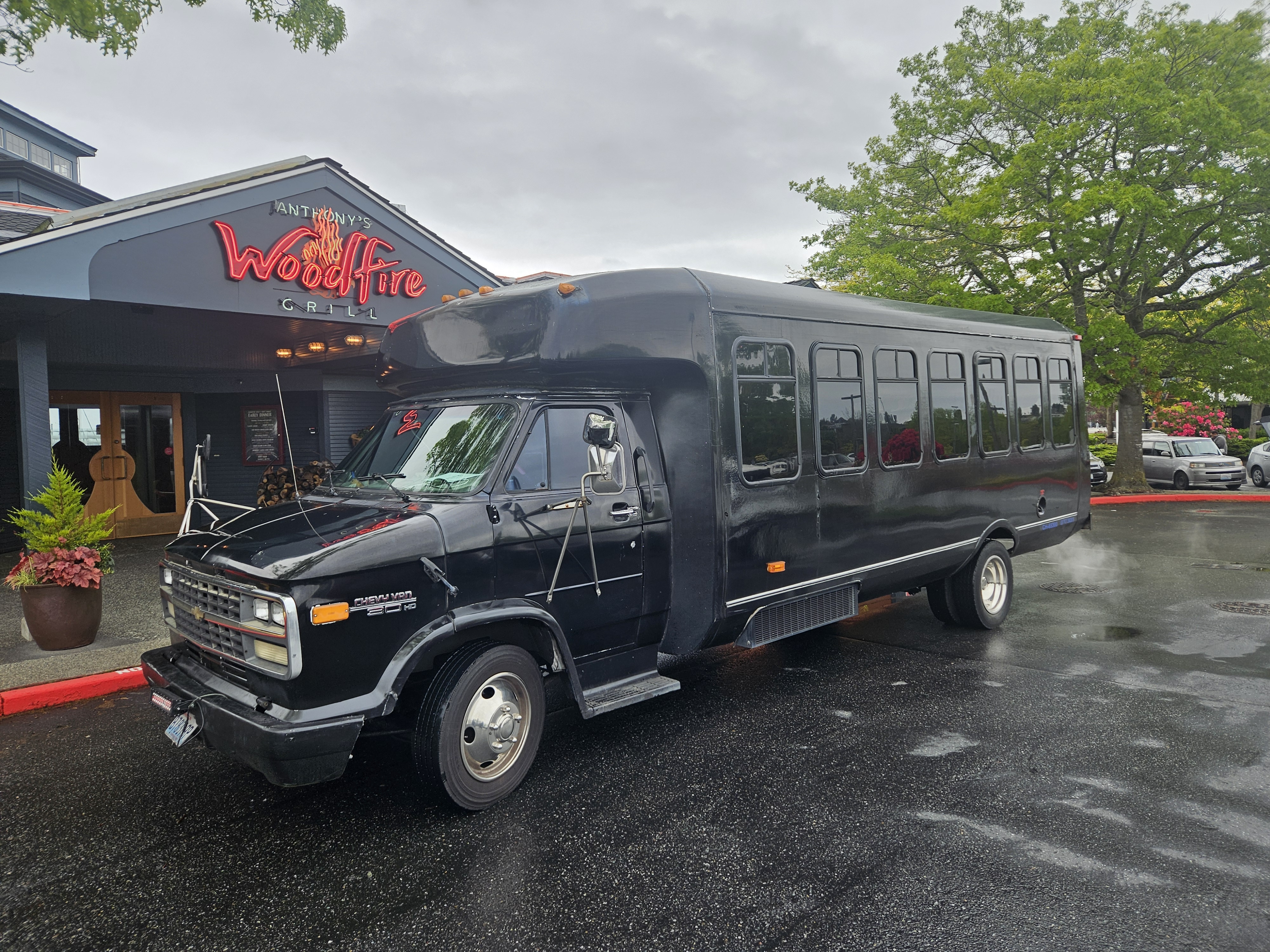 The Encore N-4 party bus exterior parked in Seattle, available for nightlife and late-night event rentals